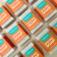 Load image into Gallery viewer, Natural shaving soaps lined up next to each other nude background - Shoreline Shaving