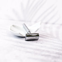 Load image into Gallery viewer, Silver Metal Safety Razor that's reusable and eco friendly. Chrome shine and textured grip on the handle - Shoreline Shaving