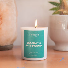 Load image into Gallery viewer, Sea salt & driftwood natural soy wax candle on bedside table by Shoreline Shaving