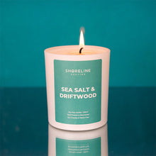 Load image into Gallery viewer, Sea salt & driftwood natural soy wax candle on a teal background by Shoreline Shaving