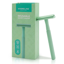 Load image into Gallery viewer, Mint Green safety razor for women &amp; men, leaning upright against the packaging box with a white background - Shoreline Shaving
