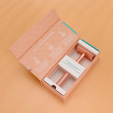 Load image into Gallery viewer, An open rose gold safety razor box displaying the safety razor and operating manual - Shoreline Shaving