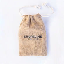 Load image into Gallery viewer, Hessian drawstring travel bag on white background, which is used to carry an eco-friendly safety razor - Shoreline Shaving