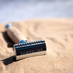 Bamboo safety razor with a wooden handle and chrome head