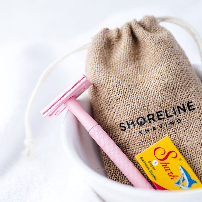 Pastel pink reusable safety razor with hessian bag and blades - Shoreline Shaving