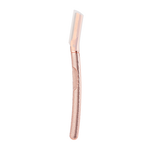Load image into Gallery viewer, Metal dermaplaner in rose gold colour with a silicone razor cover to protect the blade - Shoreline Shaving
