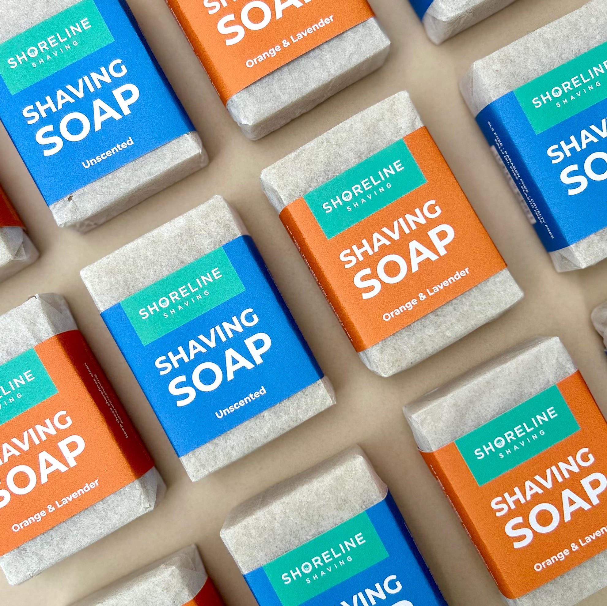 Natural shaving soap lined up next to each other on a nude background- Shoreline Shaving