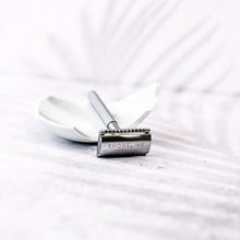Load image into Gallery viewer, Silver Metal Safety Razor that&#39;s reusable and eco friendly. Chrome shine and textured grip on the handle - Shoreline Shaving
