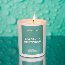 Load image into Gallery viewer, 100% natural soy wax candle on a mirrored surface and green bubbled background by Shoreline Shaving
