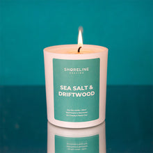 Load image into Gallery viewer, Sea salt &amp; driftwood natural soy wax candle on a teal background by Shoreline Shaving
