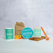 Load image into Gallery viewer, Winter pamper bundle with vivid orange razor, soy wax candle, natural moisturiser, soap dish and more shaving accessories - Shoreline Shaving
