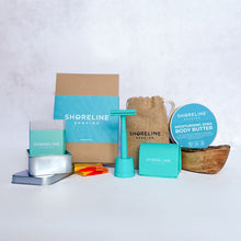 Load image into Gallery viewer, Women&#39;s grooming bundle with signature teal safety razor, matching stand, blade bank, wooden soap dish, natural moisturiser and more shaving accessories - Shoreline Shaving
