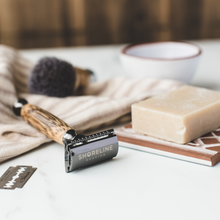 Load image into Gallery viewer, Closeup of a storm grey bamboo safety razor safety razor with shaving soap - Shoreline Shaving
